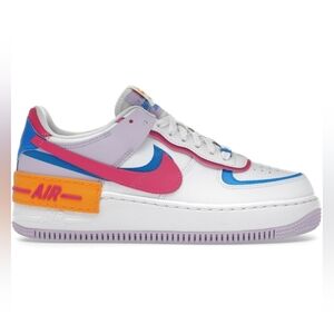 Nike White and Blue Sneakers with Orange Tag